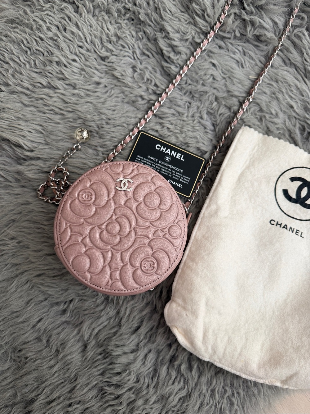 CHANEL Blush Pink Camellia Embossed Round Crossbody Bag